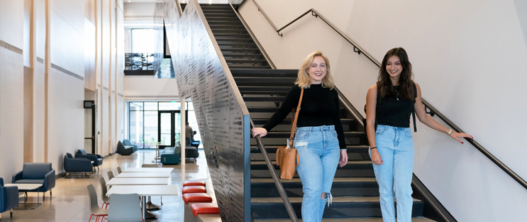 Two students on the stairs