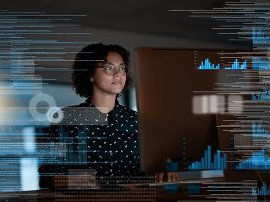 Young Black woman showcasing computer programing skills