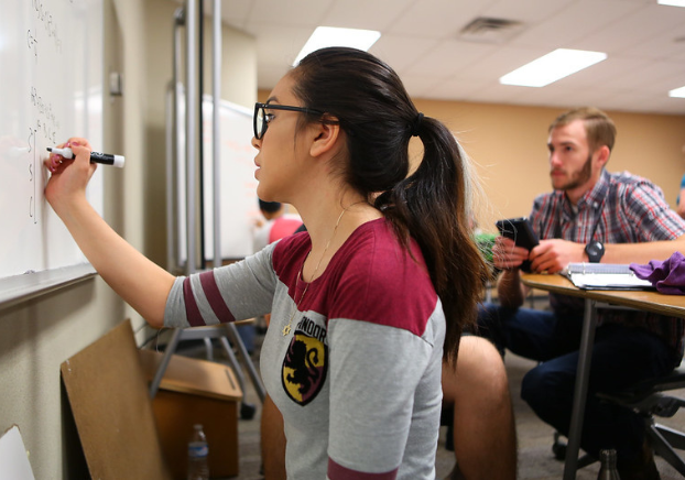 Student on the white board